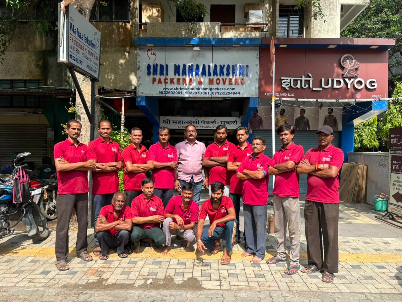 Uniformed packing and loading team of Shri Mahaalakshmi Packers and Movers outside the Khamla office in Nagpur