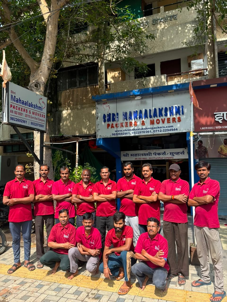 Shri Mahaalakshmi Packers and Movers Nagpur staff in uniform at the Khamla office
